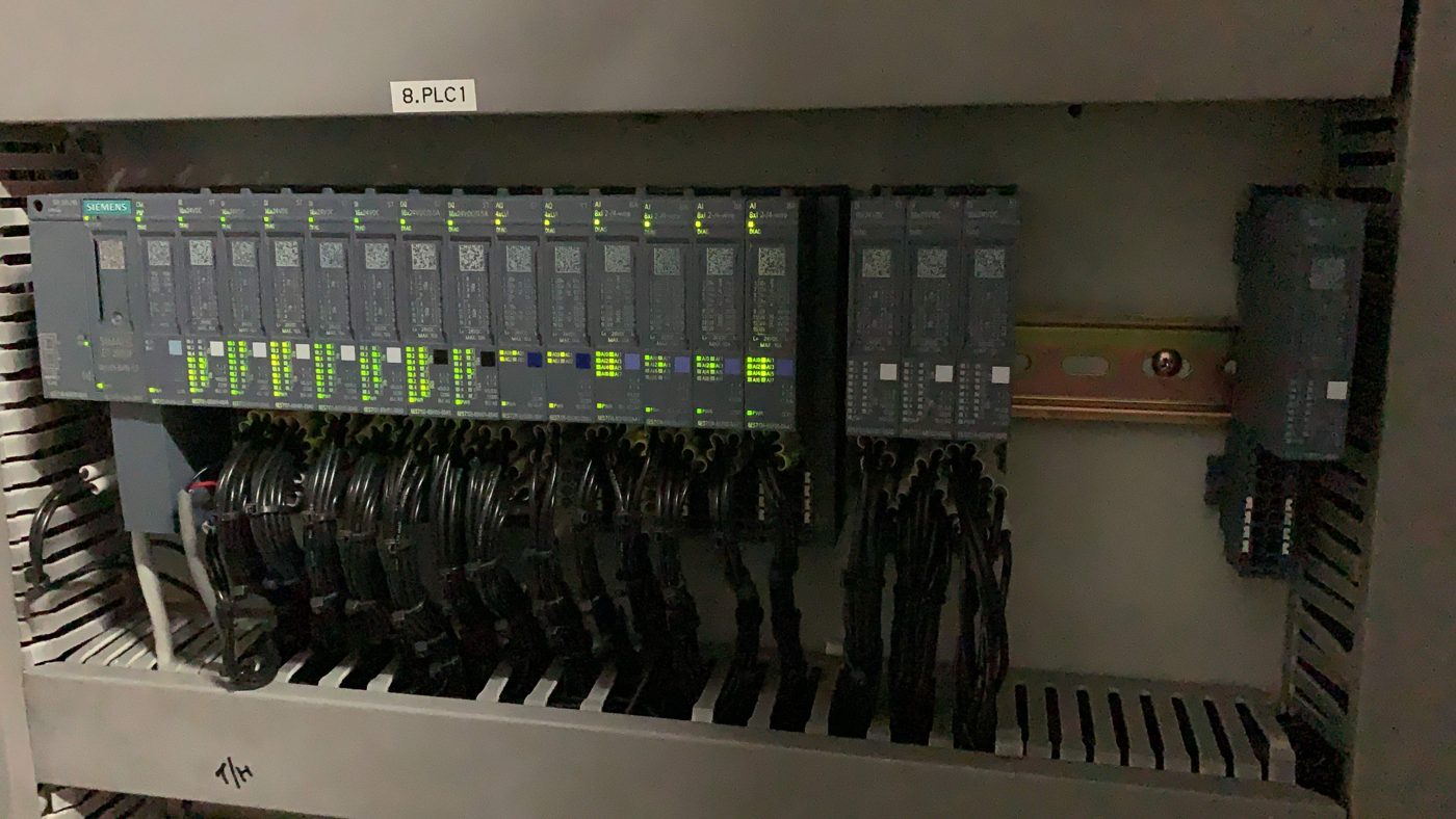 Centech engineer providing hands-on technical support for Siemens ET200SP system